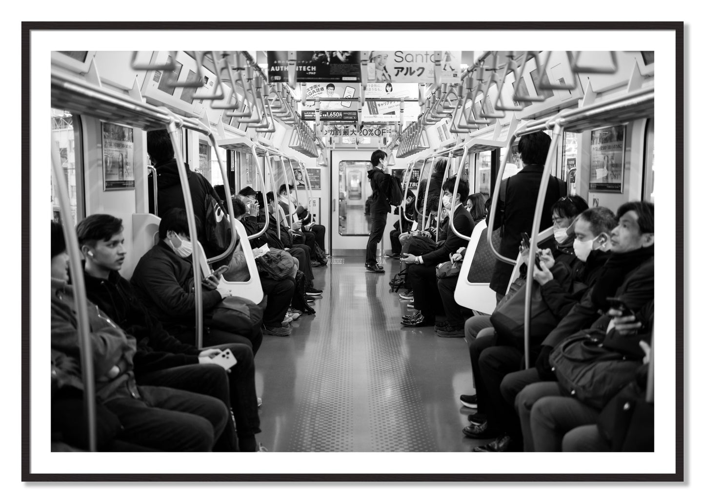 Framed photograph of Tokyo Traincar by Dylan Ozanich, Black Walnut frame, Borders
