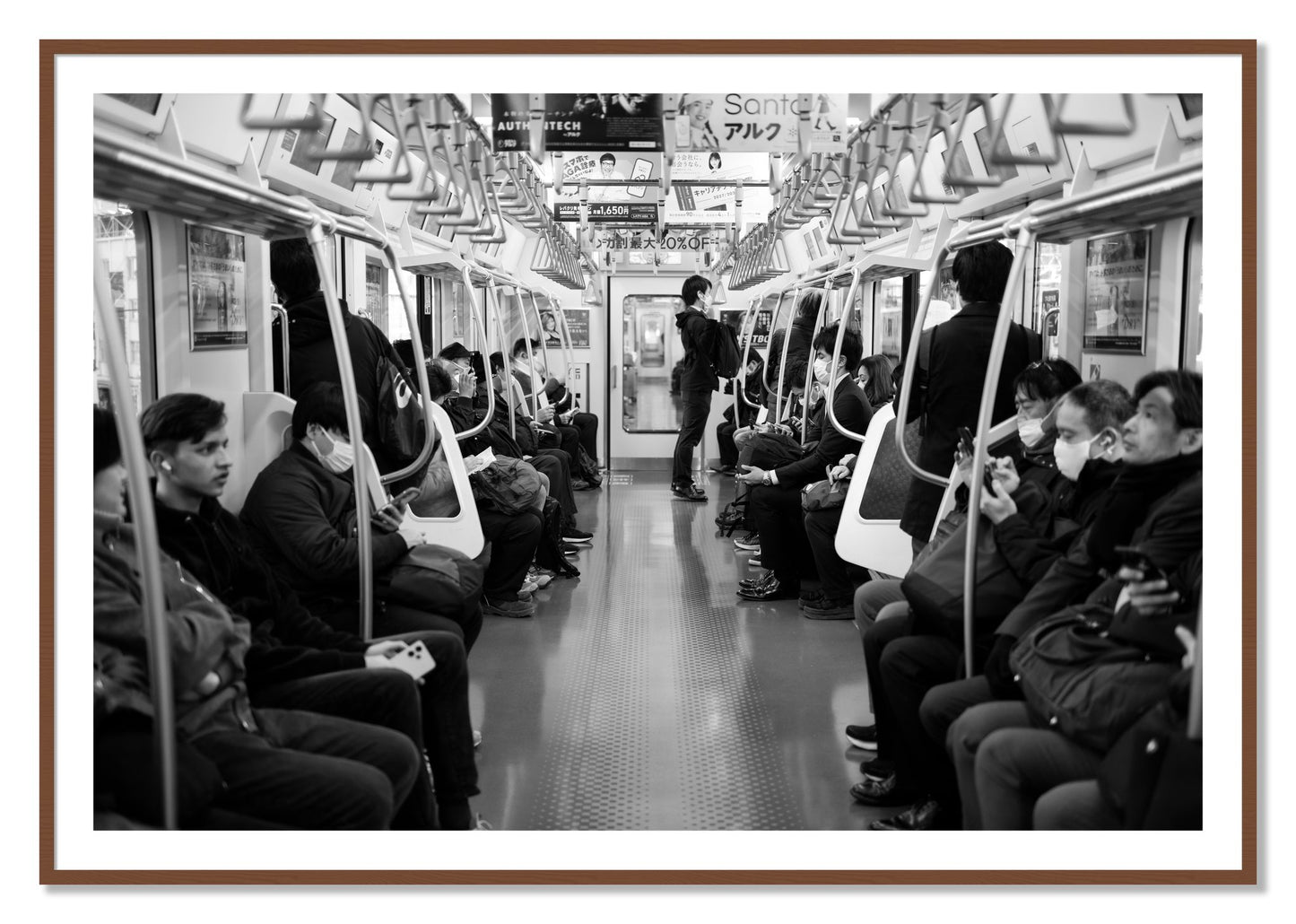 Framed photograph of Tokyo Traincar by Dylan Ozanich, Walnut frame, Borders