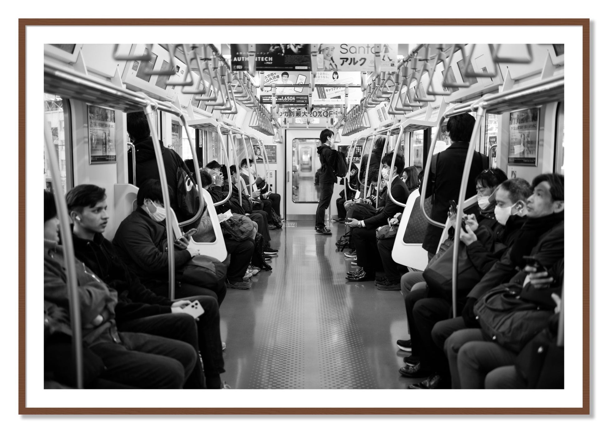 Framed photograph of Tokyo Traincar by Dylan Ozanich, Walnut frame, Borders