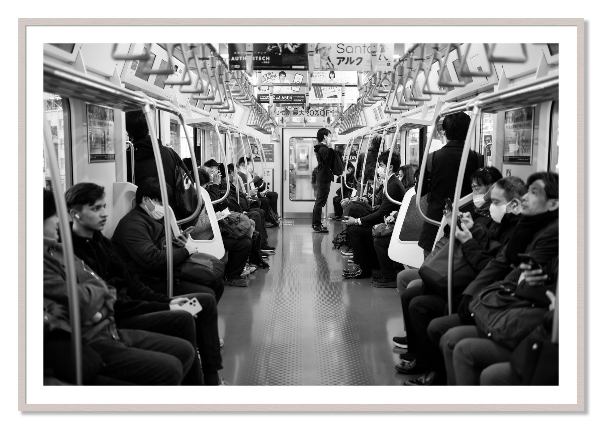 Framed photograph of Tokyo Traincar by Dylan Ozanich, White Maple frame, Borders