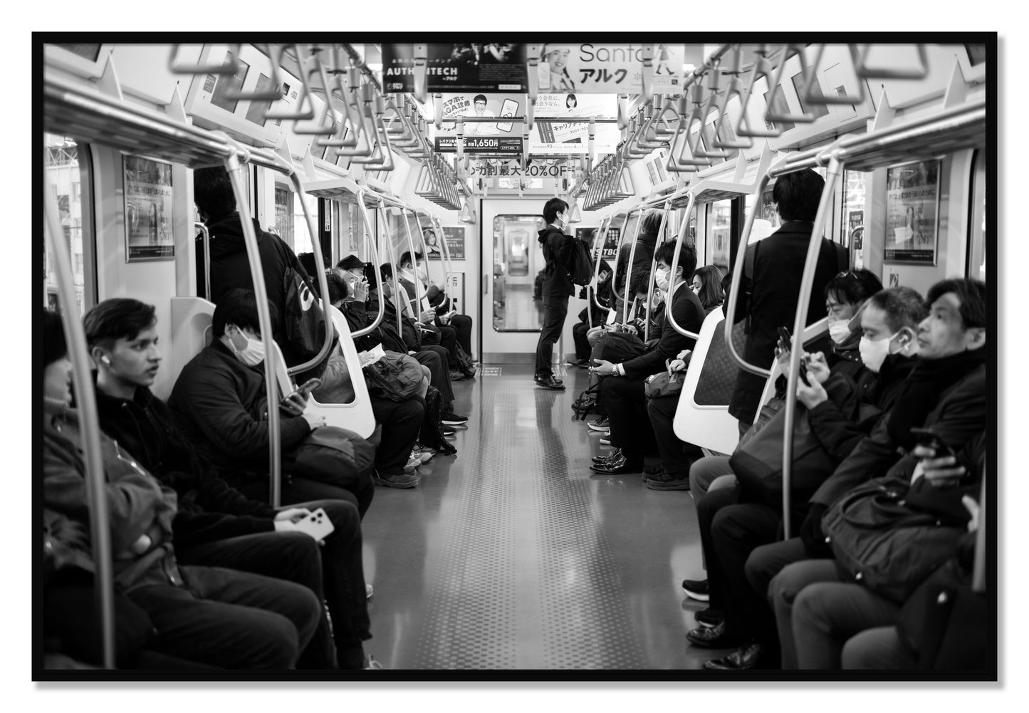 Framed photograph of Tokyo Traincar by Dylan Ozanich, Black frame, Full Bleed