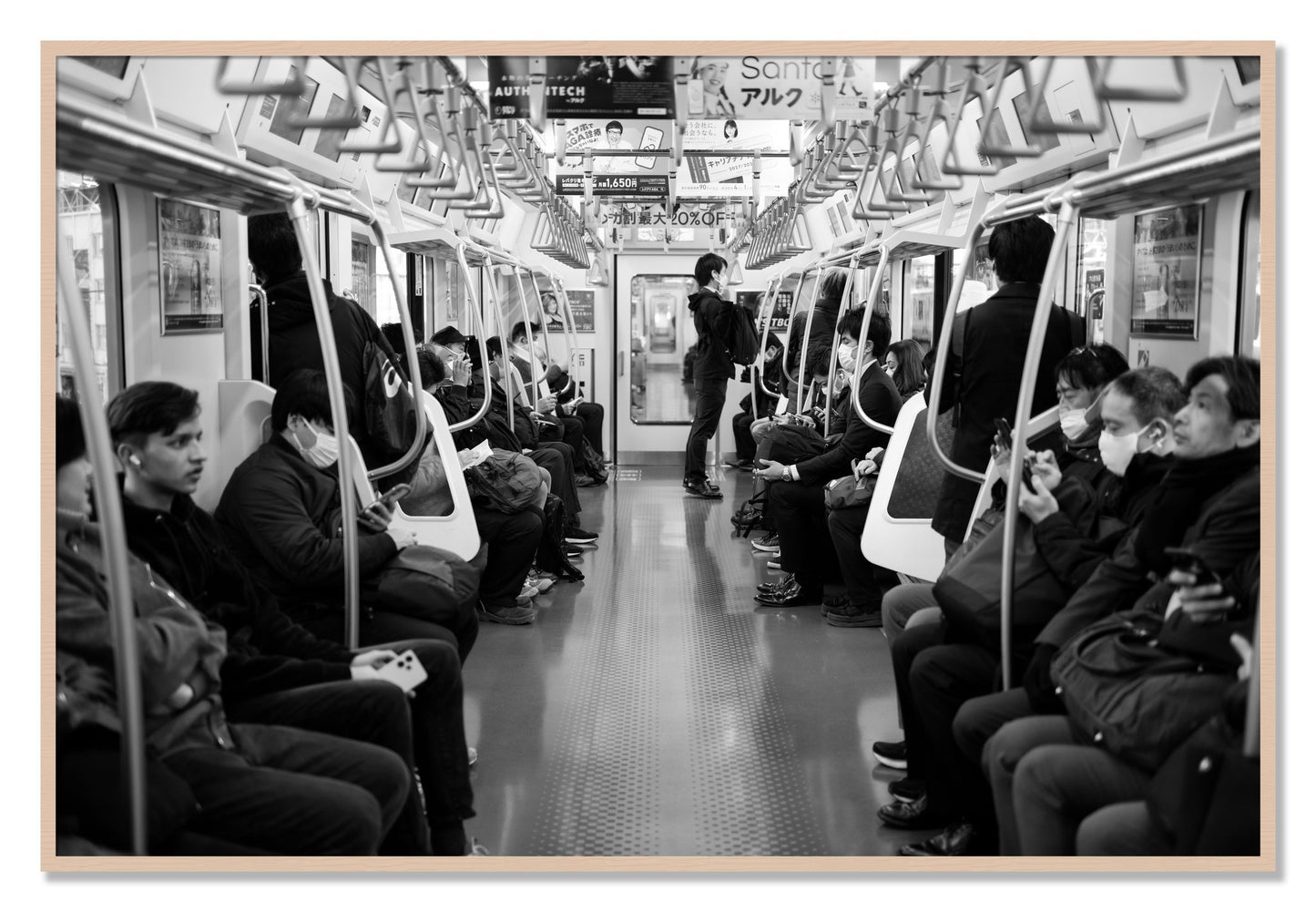 Framed photograph of Tokyo Traincar by Dylan Ozanich, Maple frame, Full Bleed
