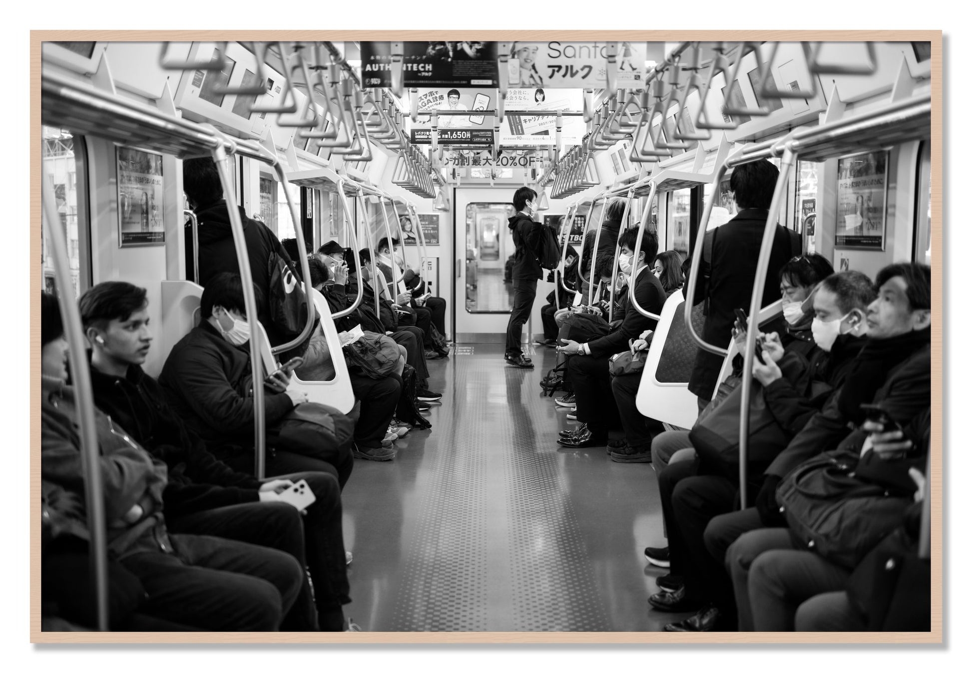 Framed photograph of Tokyo Traincar by Dylan Ozanich, Maple frame, Full Bleed