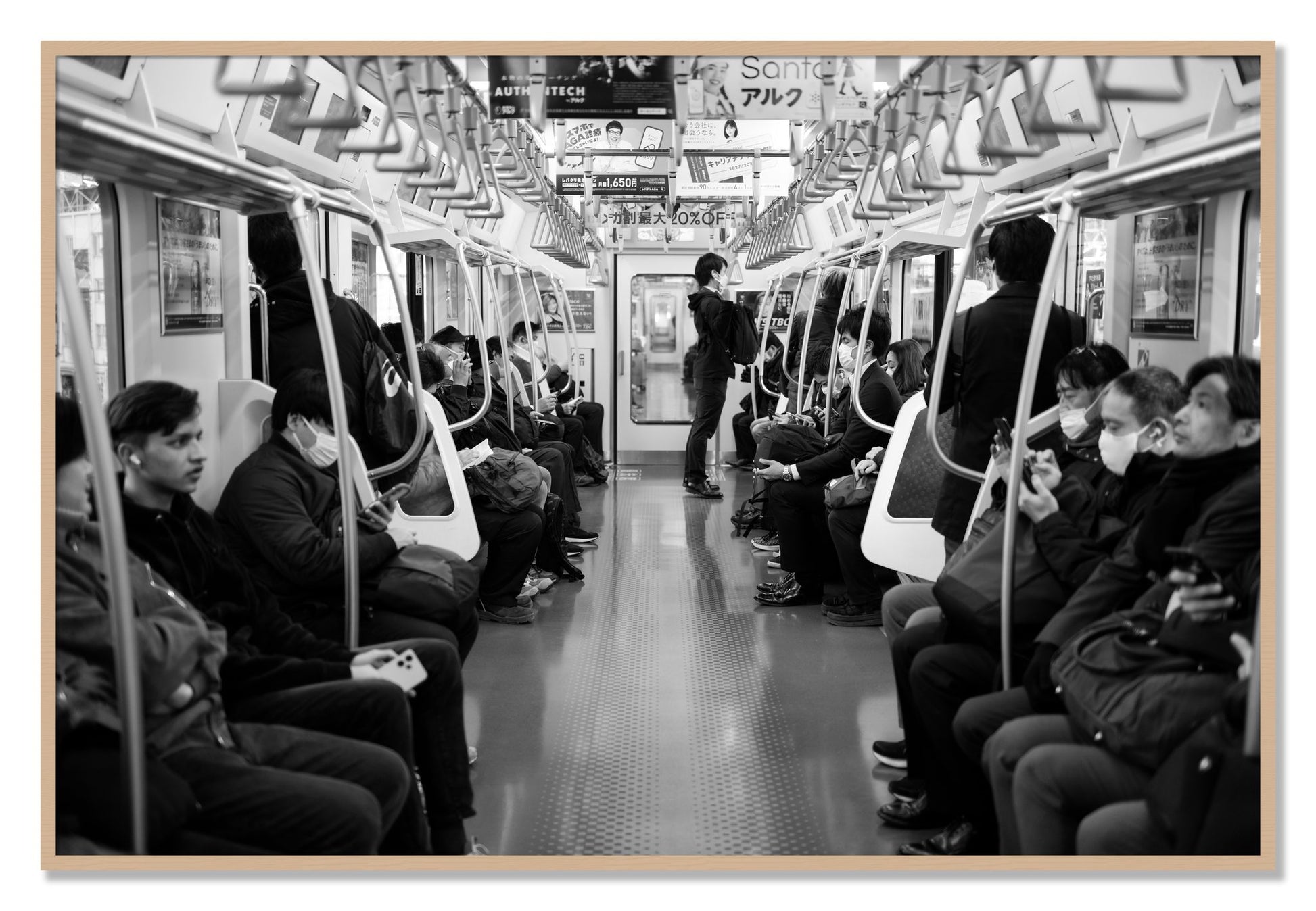 Framed photograph of Tokyo Traincar by Dylan Ozanich, Oak frame, Full Bleed