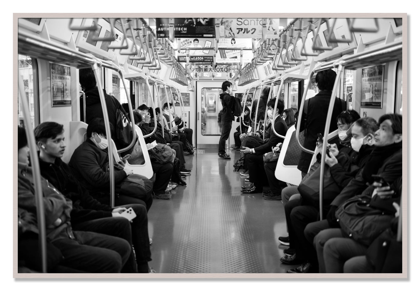 Framed photograph of Tokyo Traincar by Dylan Ozanich, White Maple frame, Full Bleed