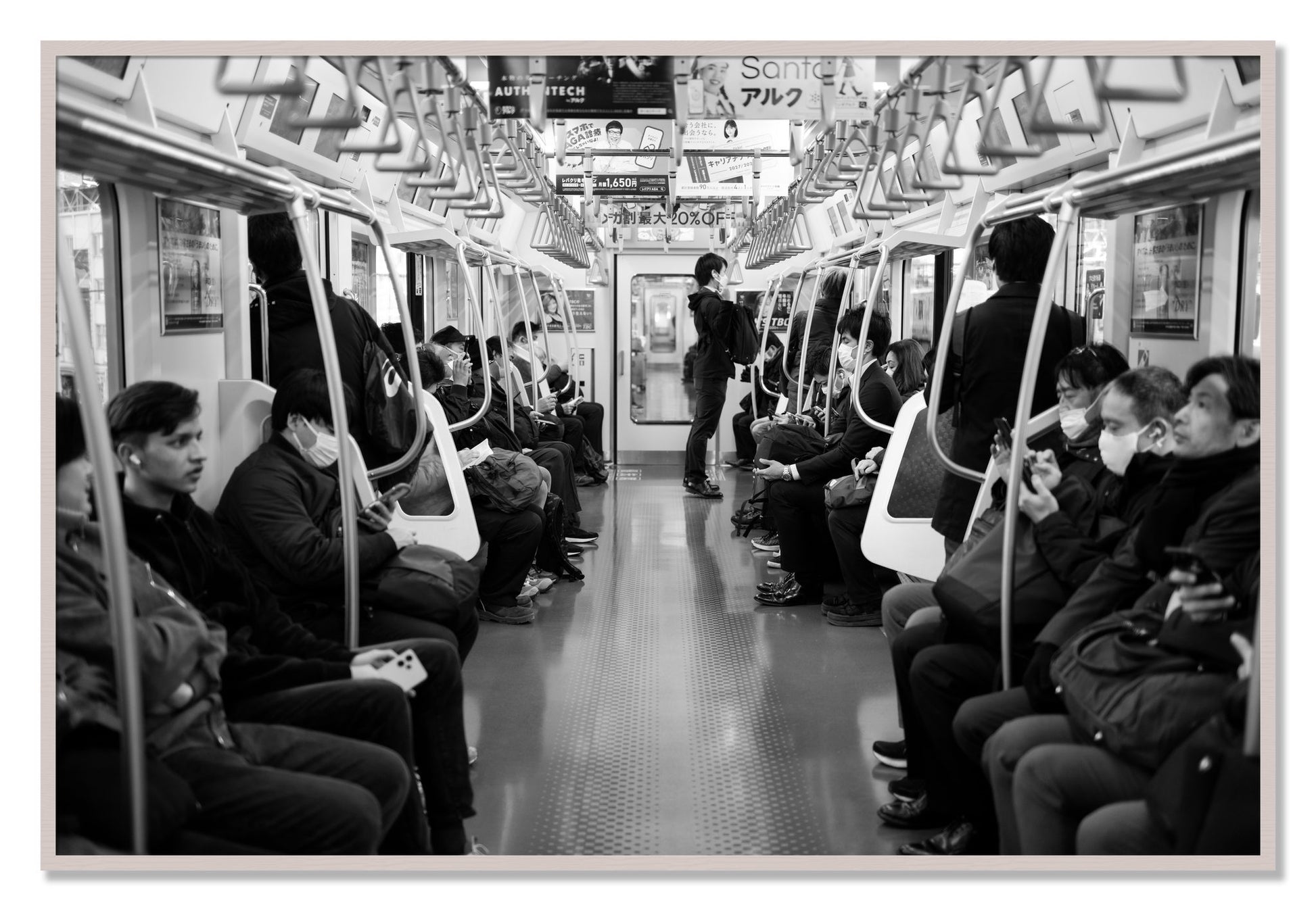 Framed photograph of Tokyo Traincar by Dylan Ozanich, White Maple frame, Full Bleed