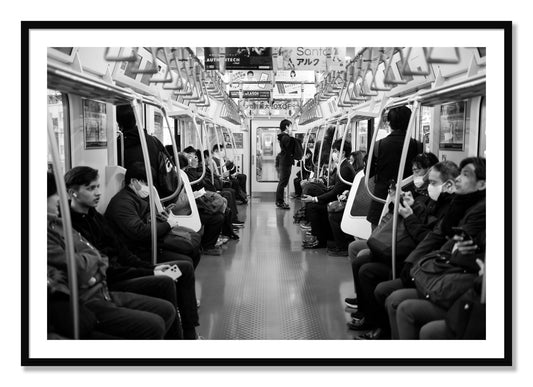 Framed photograph of Tokyo Traincar by Dylan Ozanich, Black frame, Borders