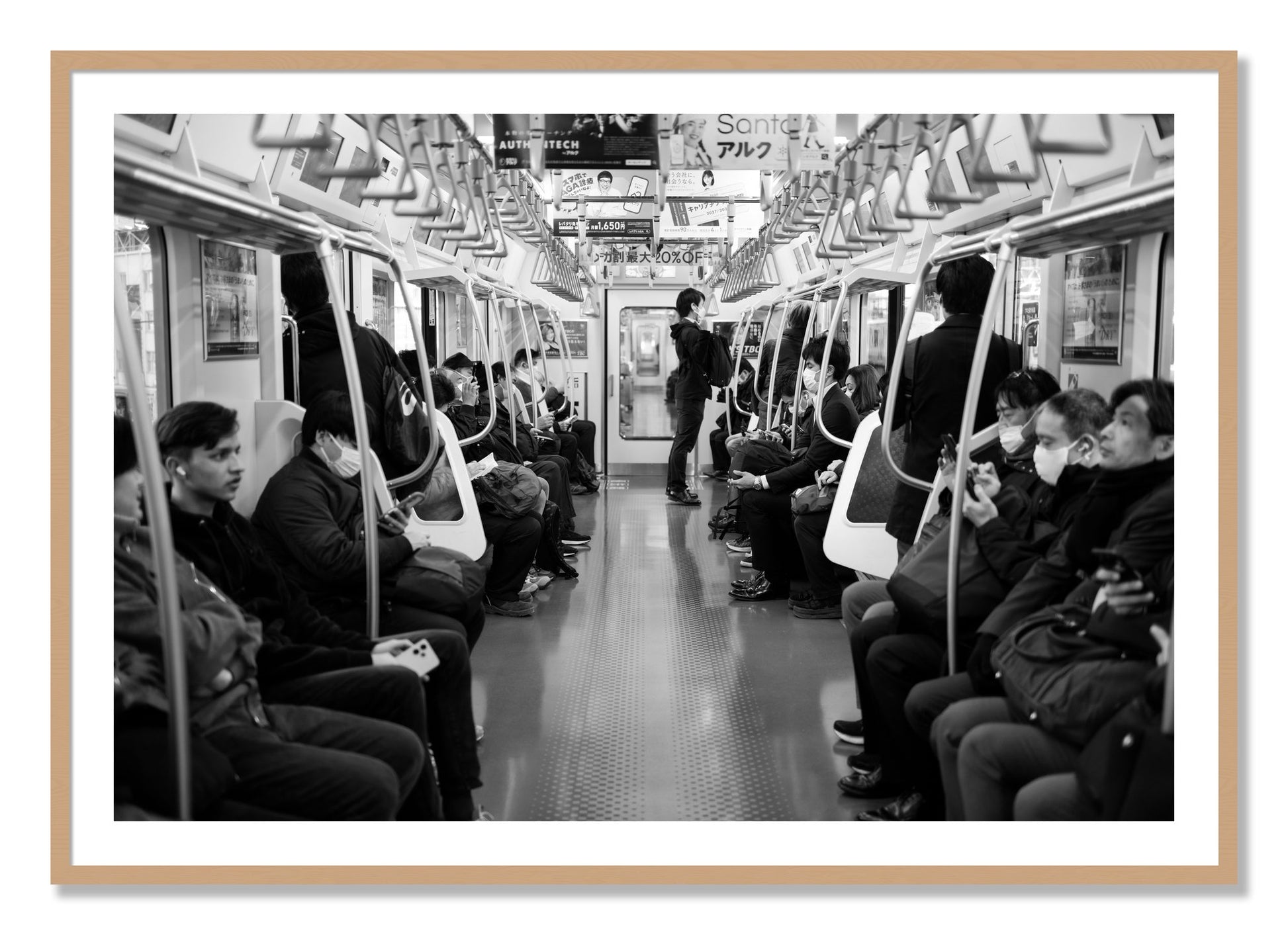 Framed photograph of Tokyo Traincar by Dylan Ozanich, Oak frame, Borders