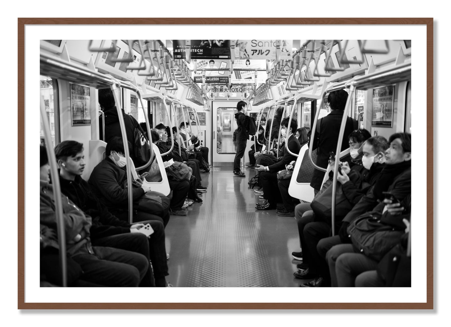 Framed photograph of Tokyo Traincar by Dylan Ozanich, Walnut frame, Borders