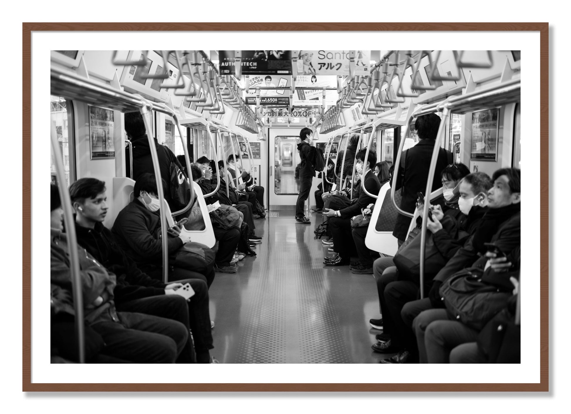 Framed photograph of Tokyo Traincar by Dylan Ozanich, Walnut frame, Borders