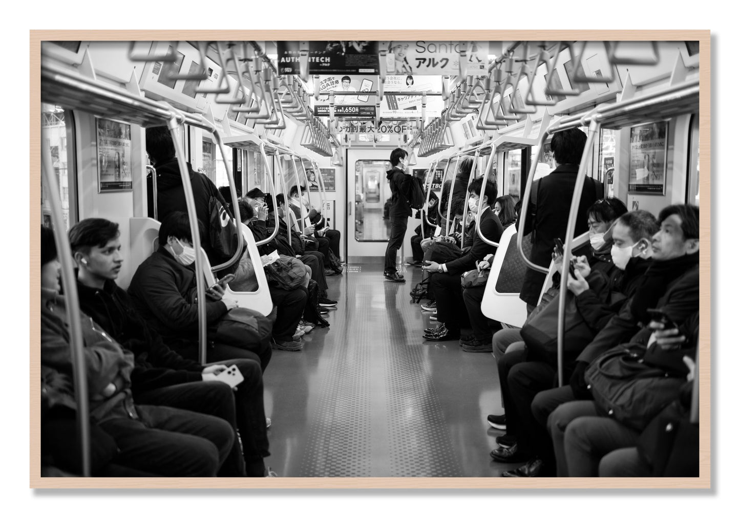 Framed photograph of Tokyo Traincar by Dylan Ozanich, Maple frame, Full Bleed