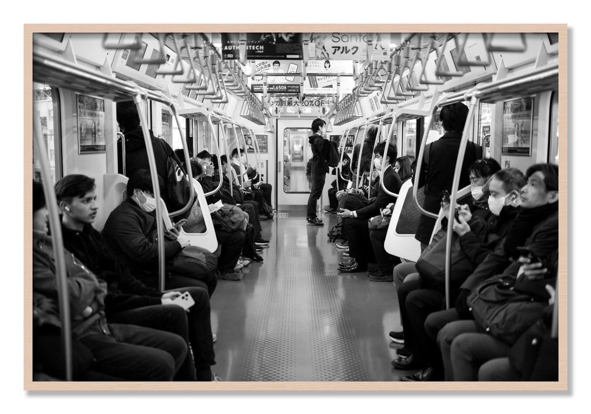 Framed photograph of Tokyo Traincar by Dylan Ozanich, Maple frame, Full Bleed