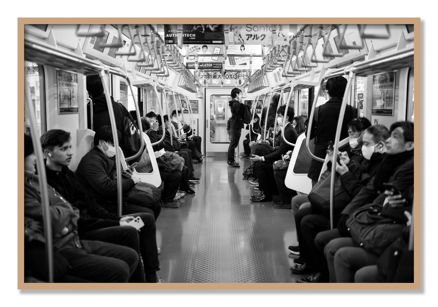 Framed photograph of Tokyo Traincar by Dylan Ozanich, Oak frame, Full Bleed