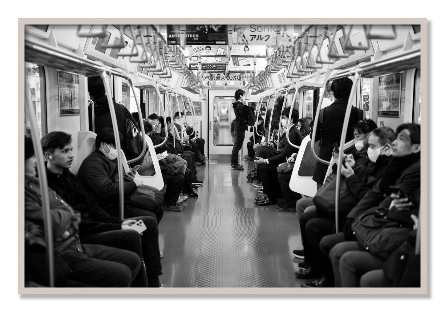 Framed photograph of Tokyo Traincar by Dylan Ozanich, White Maple frame, Full Bleed