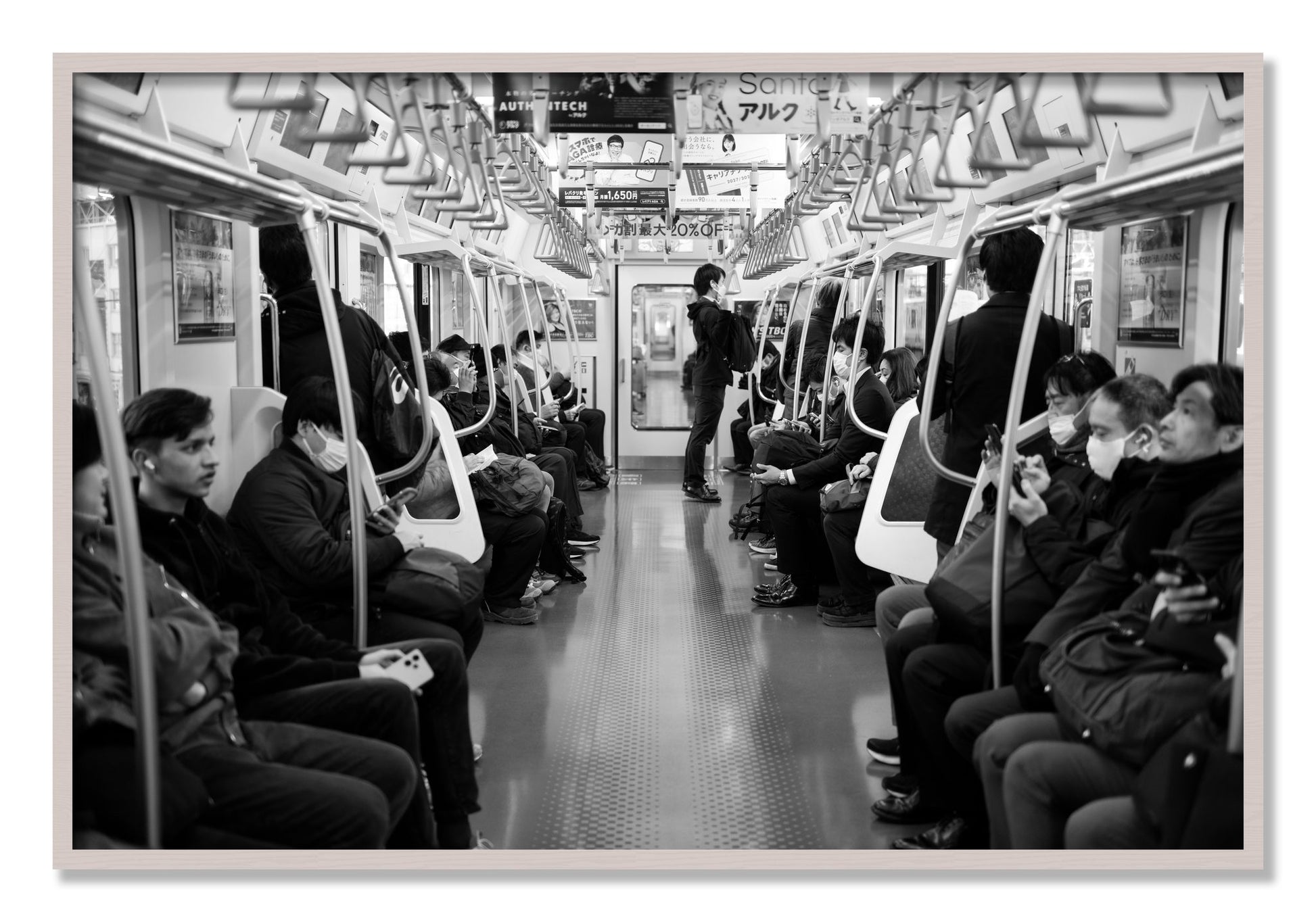 Framed photograph of Tokyo Traincar by Dylan Ozanich, White Maple frame, Full Bleed
