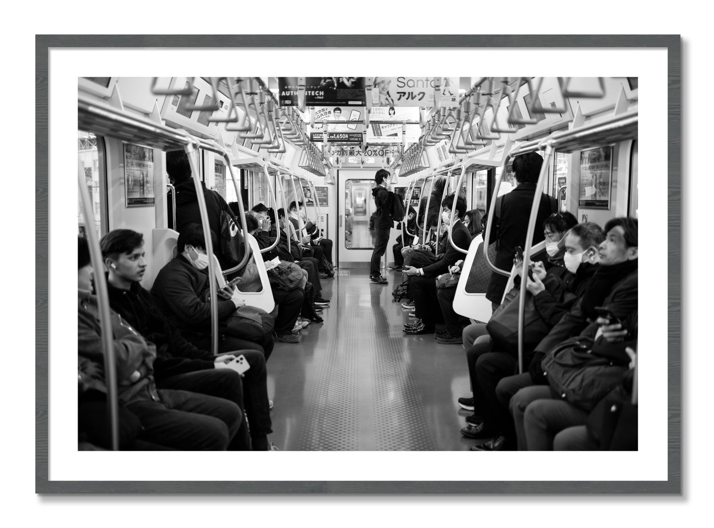 Framed photograph of Tokyo Traincar by Dylan Ozanich, Grey frame, Borders