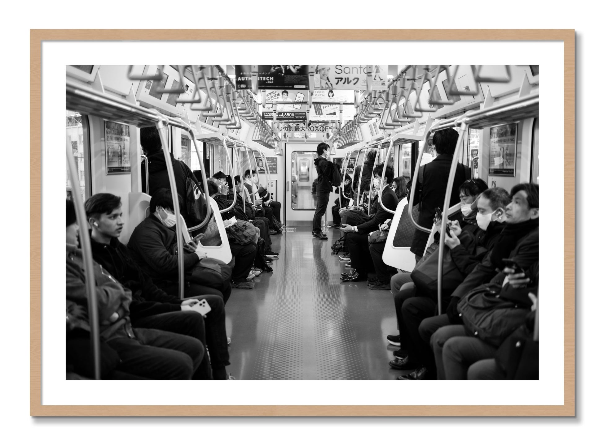 Framed photograph of Tokyo Traincar by Dylan Ozanich, Oak frame, Borders