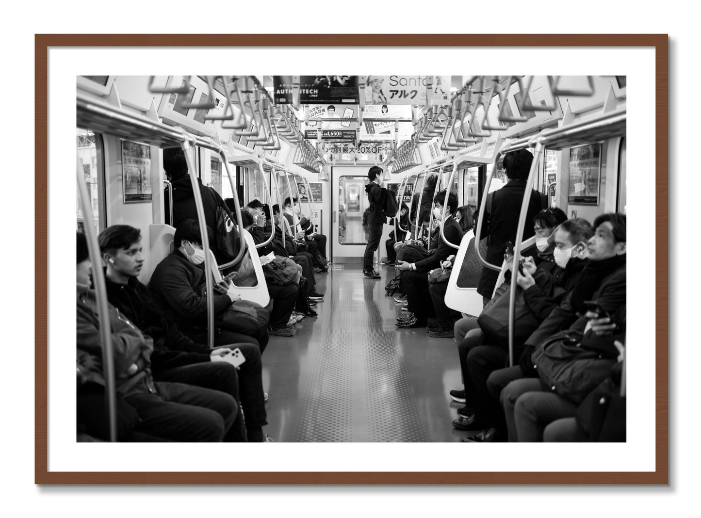 Framed photograph of Tokyo Traincar by Dylan Ozanich, Walnut frame, Borders