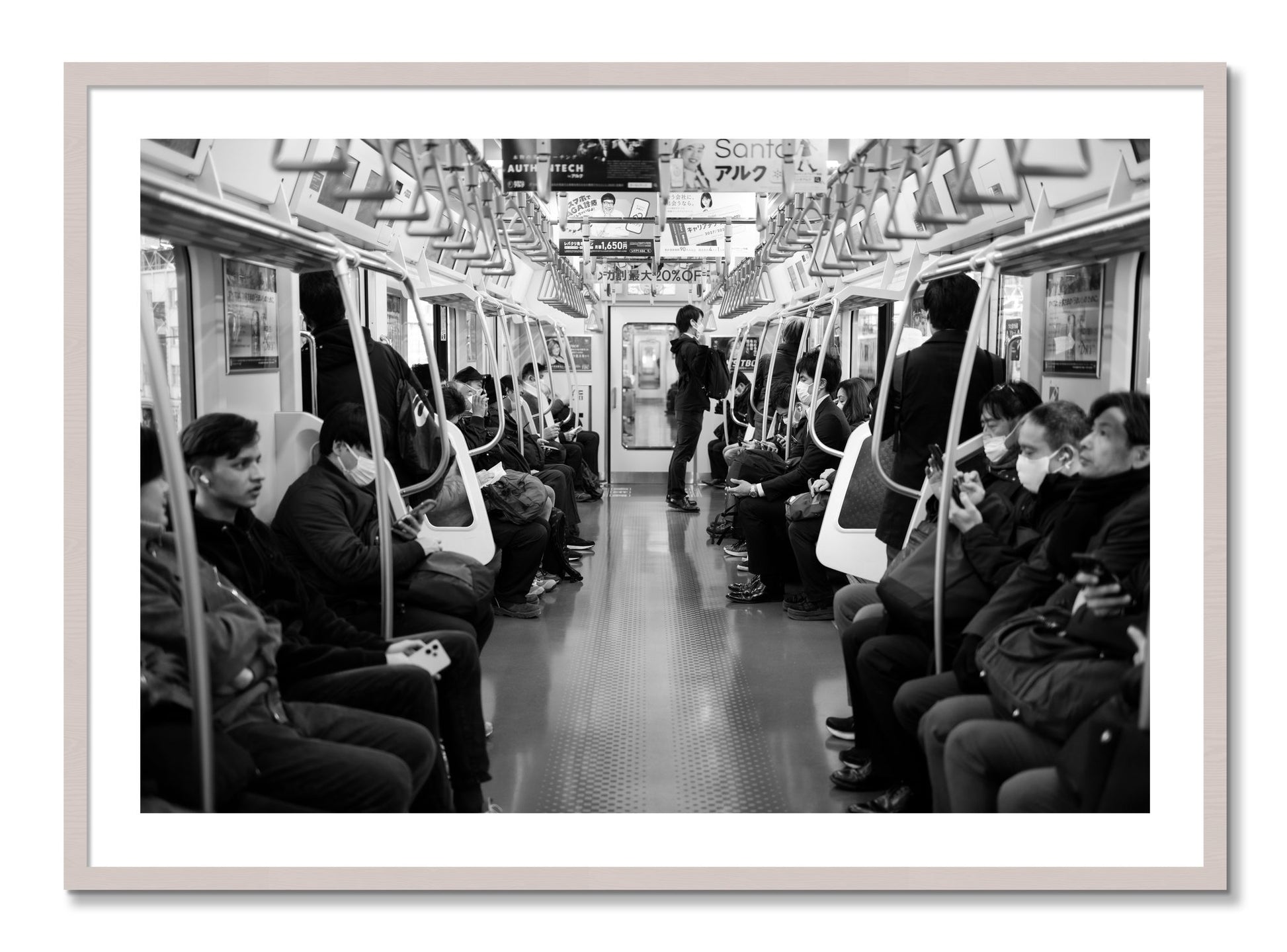 Framed photograph of Tokyo Traincar by Dylan Ozanich, White Maple frame, Borders