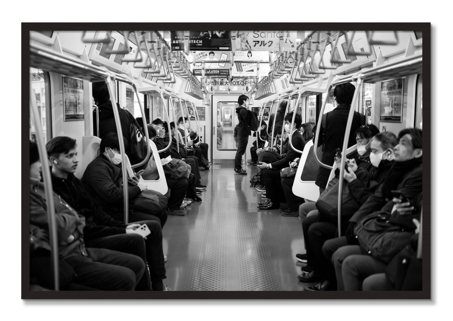 Framed photograph of Tokyo Traincar by Dylan Ozanich, Black Walnut frame, Full Bleed