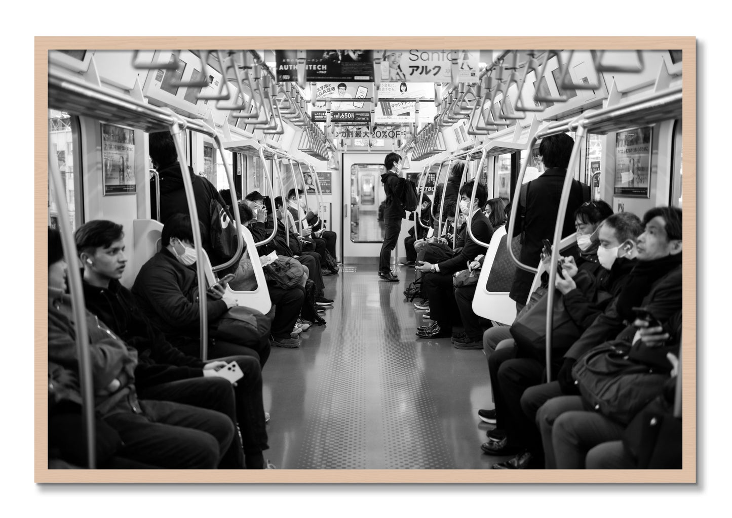 Framed photograph of Tokyo Traincar by Dylan Ozanich, Maple frame, Full Bleed