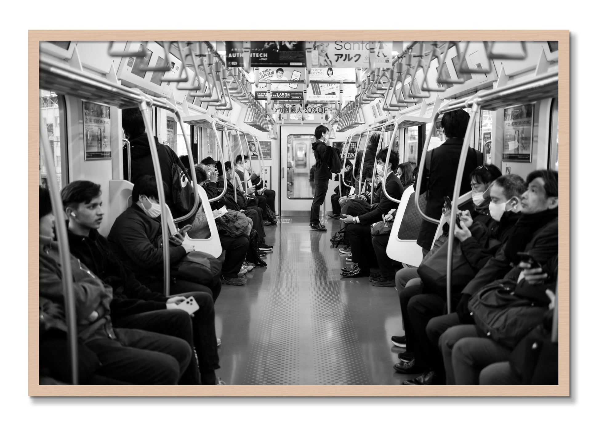 Framed photograph of Tokyo Traincar by Dylan Ozanich, Maple frame, Full Bleed