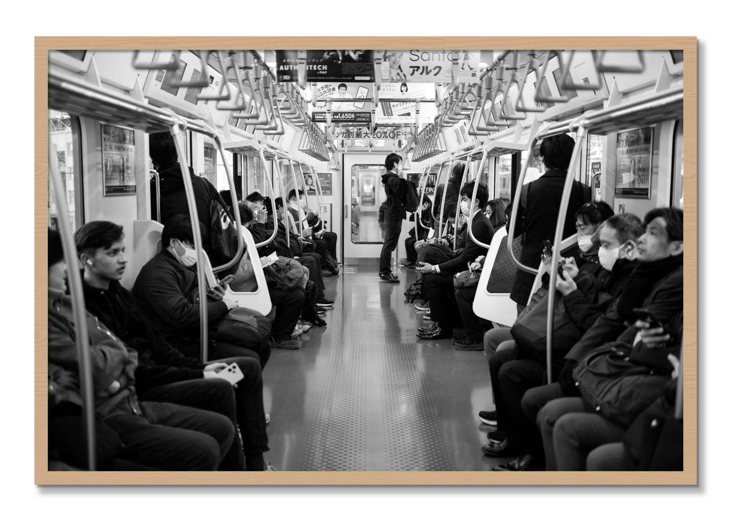 Framed photograph of Tokyo Traincar by Dylan Ozanich, Oak frame, Full Bleed