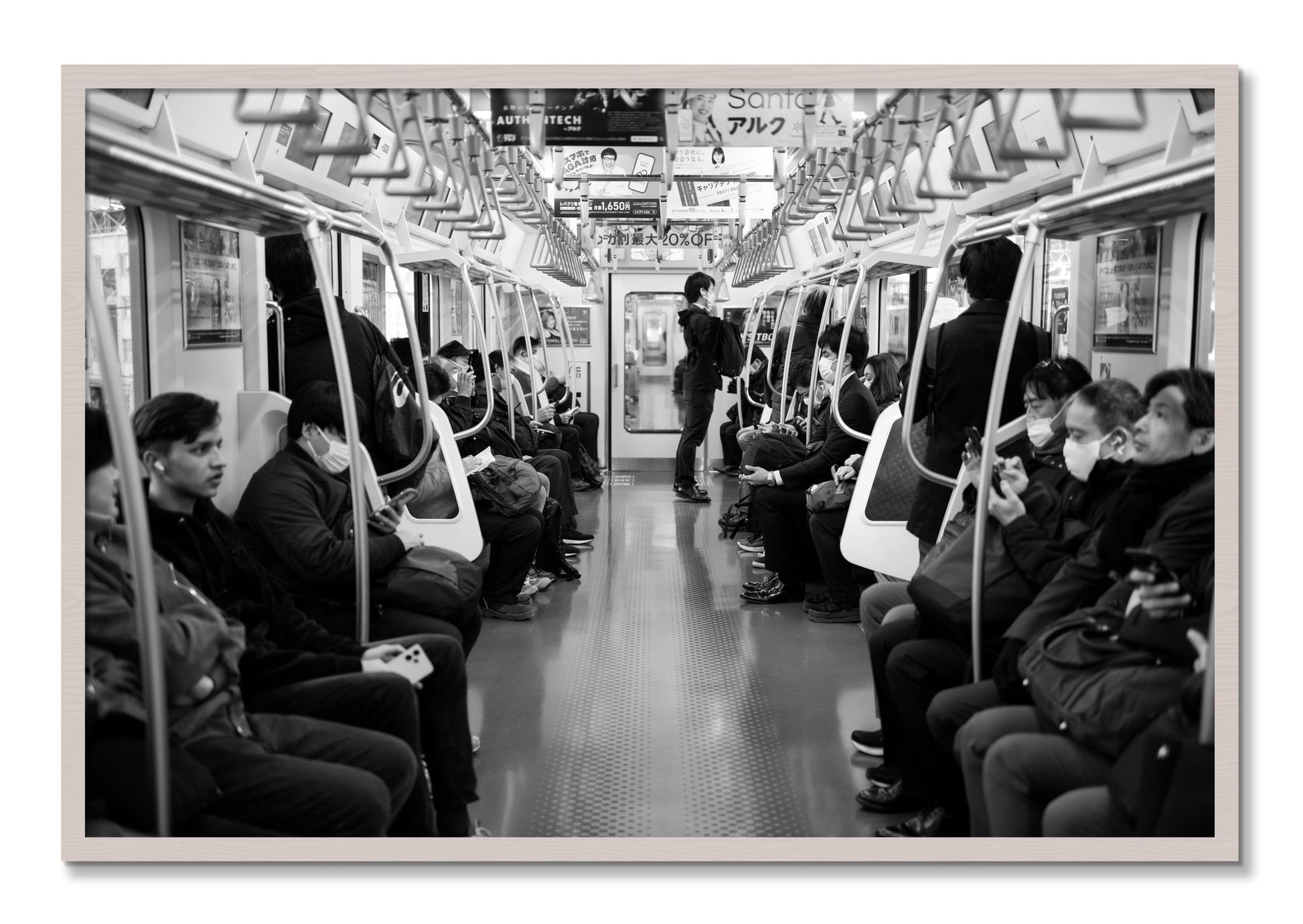 Framed photograph of Tokyo Traincar by Dylan Ozanich, White Maple frame, Full Bleed
