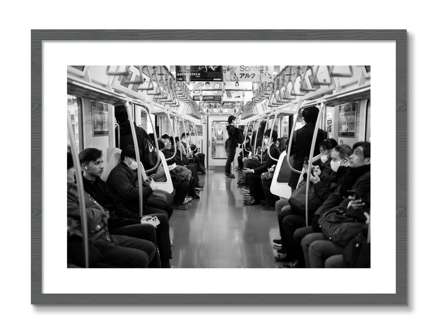 Framed photograph of Tokyo Traincar by Dylan Ozanich, Grey frame, Borders