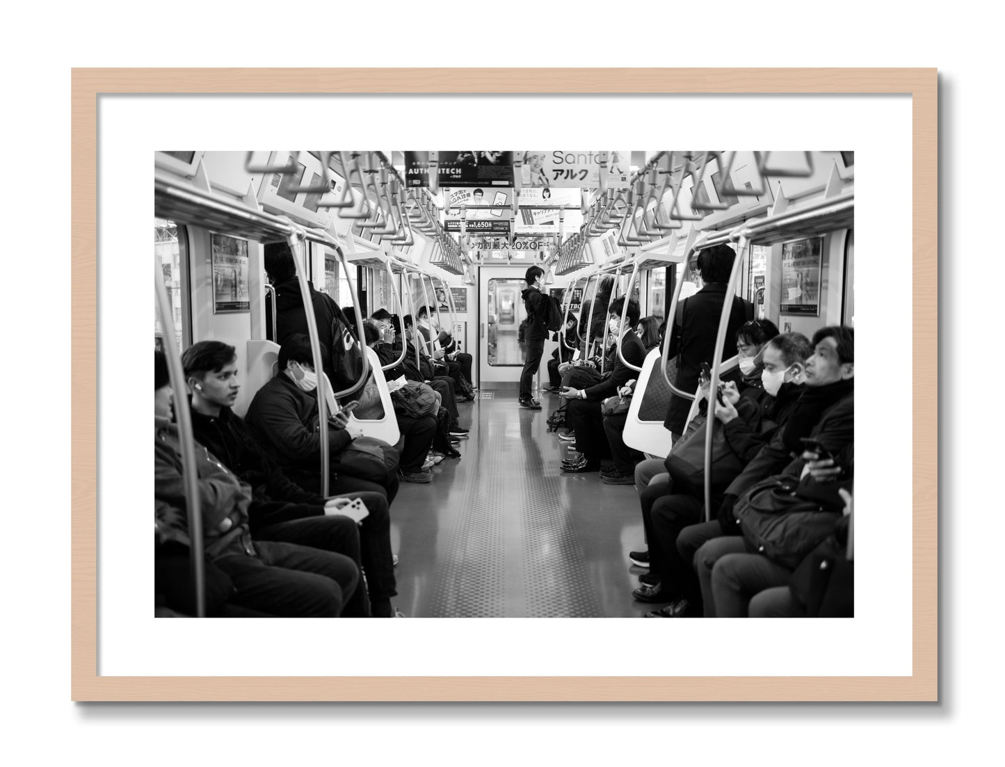Framed photograph of Tokyo Traincar by Dylan Ozanich, Maple frame, Borders