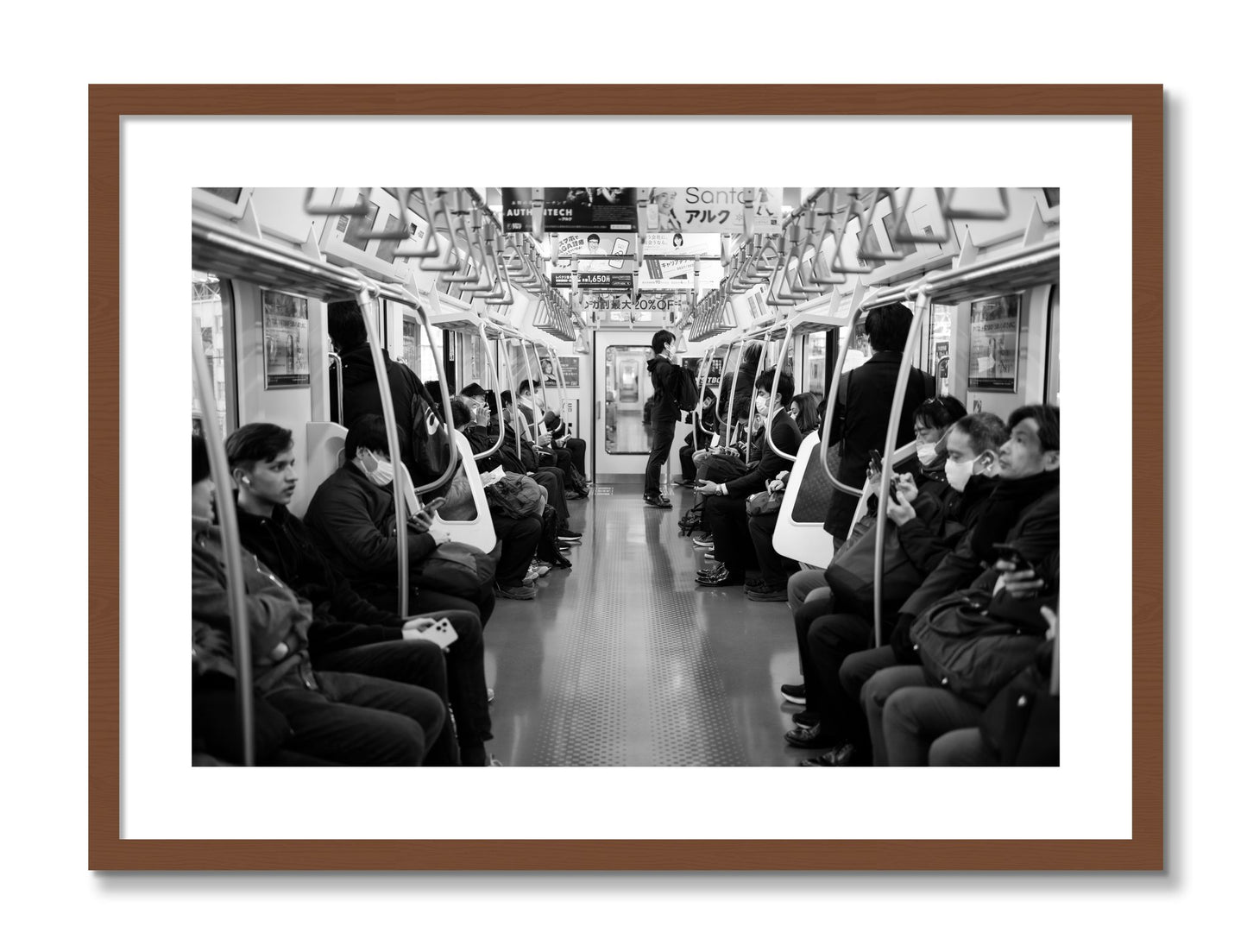 Framed photograph of Tokyo Traincar by Dylan Ozanich, Walnut frame, Borders