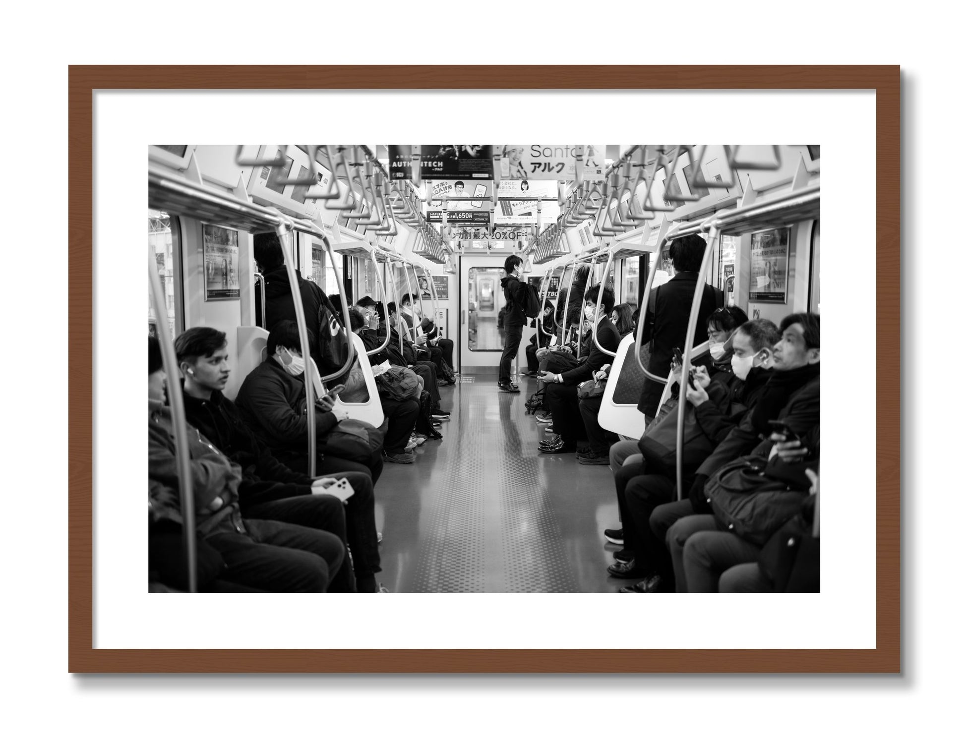 Framed photograph of Tokyo Traincar by Dylan Ozanich, Walnut frame, Borders