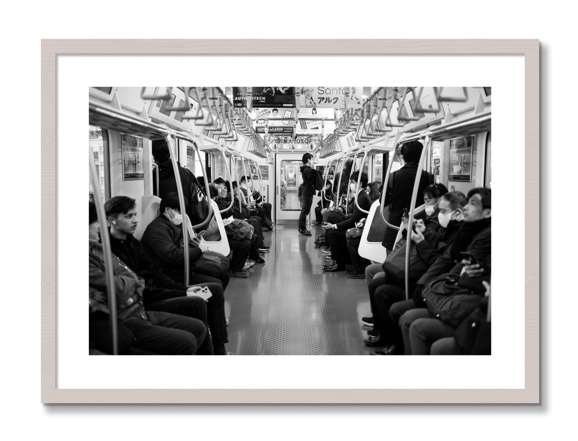 Framed photograph of Tokyo Traincar by Dylan Ozanich, White Maple frame, Borders