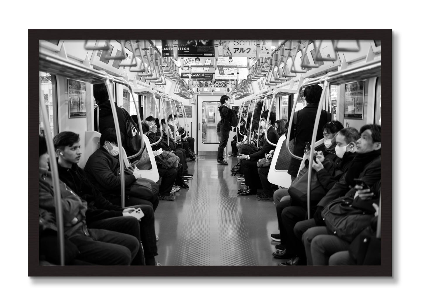 Framed photograph of Tokyo Traincar by Dylan Ozanich, Black Walnut frame, Full Bleed