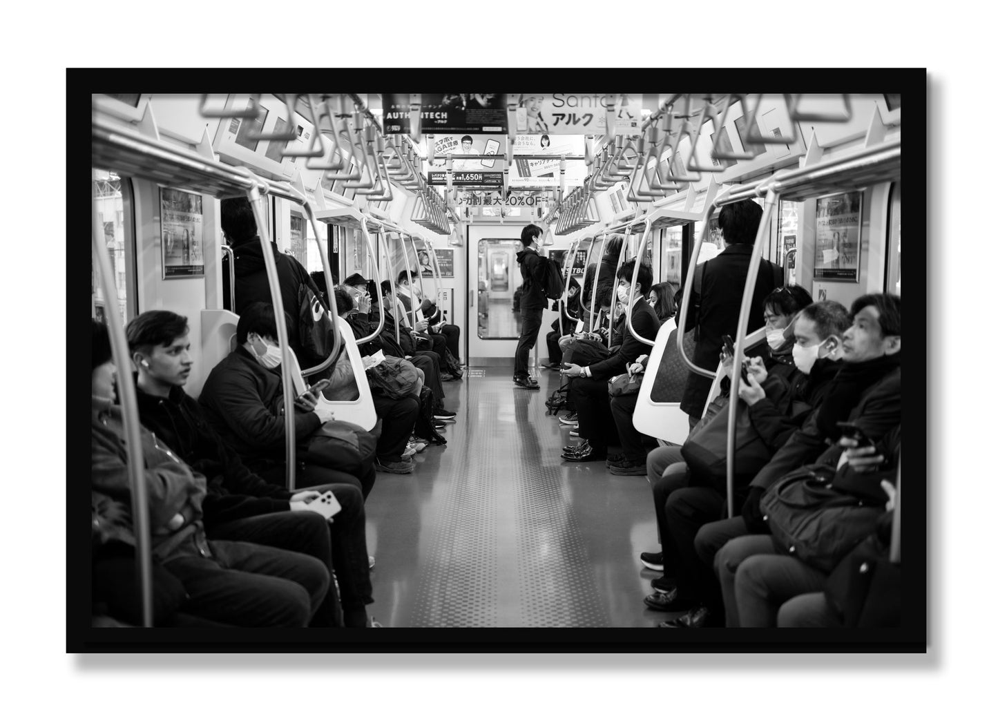 Framed photograph of Tokyo Traincar by Dylan Ozanich, Black frame, Full Bleed