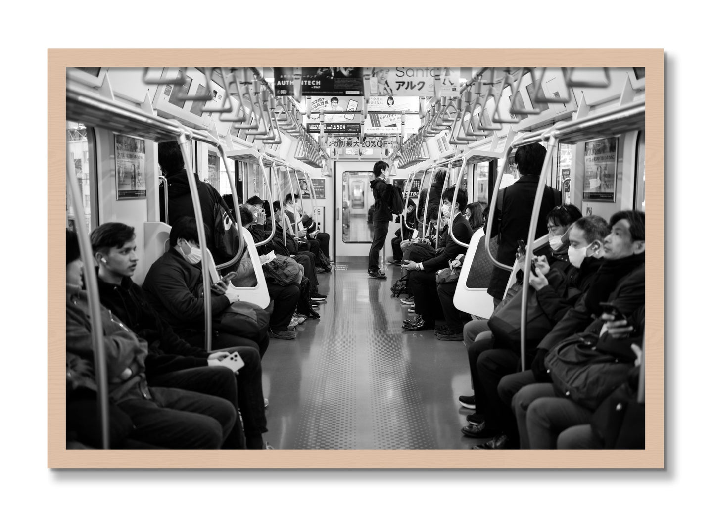 Framed photograph of Tokyo Traincar by Dylan Ozanich, Maple frame, Full Bleed