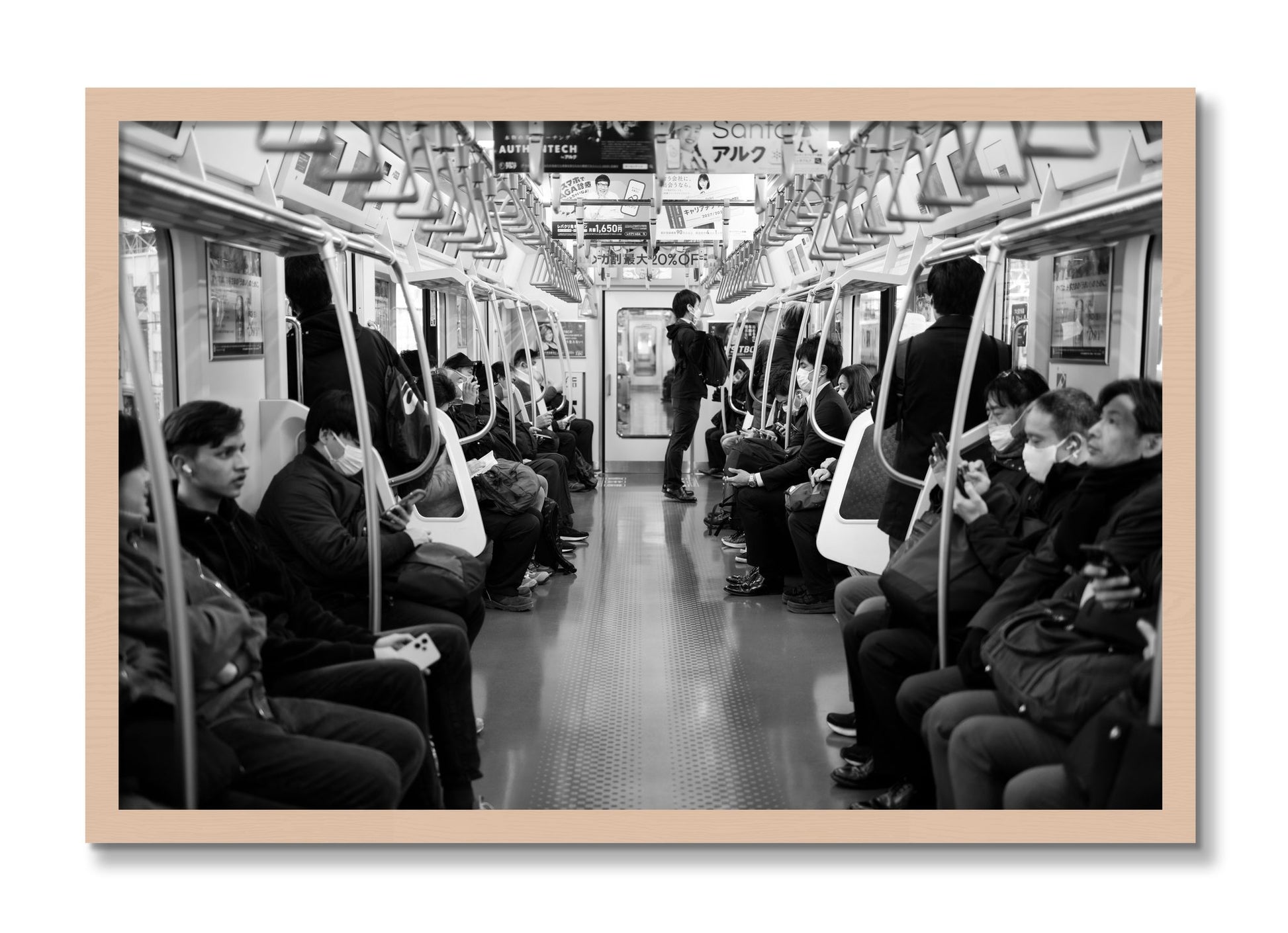 Framed photograph of Tokyo Traincar by Dylan Ozanich, Maple frame, Full Bleed