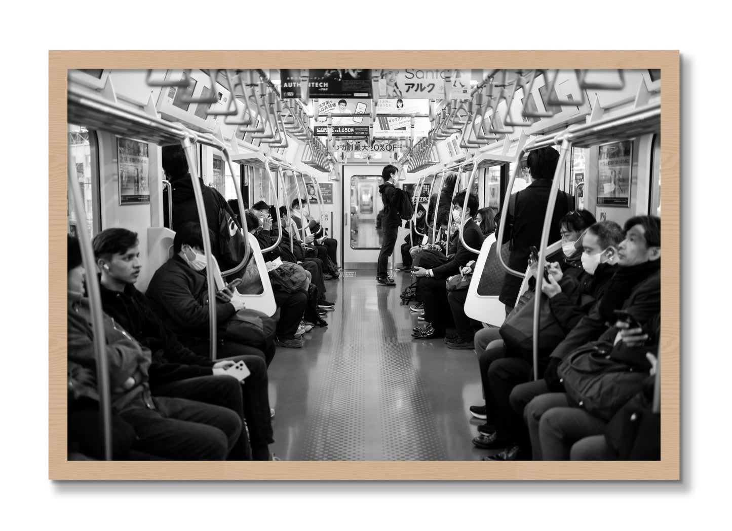 Framed photograph of Tokyo Traincar by Dylan Ozanich, Oak frame, Full Bleed