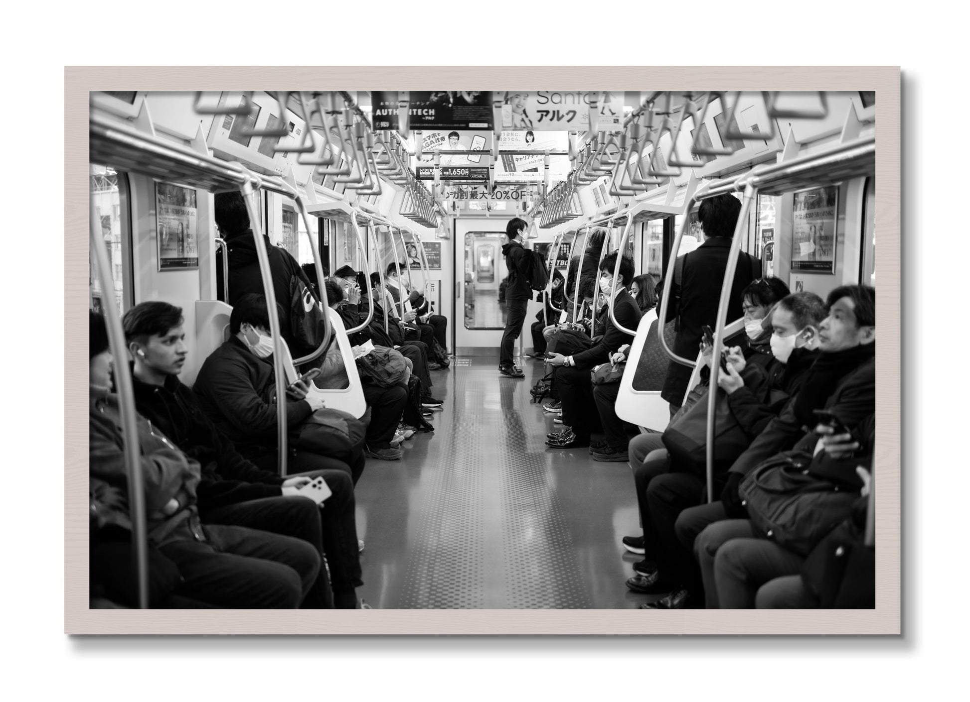 Framed photograph of Tokyo Traincar by Dylan Ozanich, White Maple frame, Full Bleed