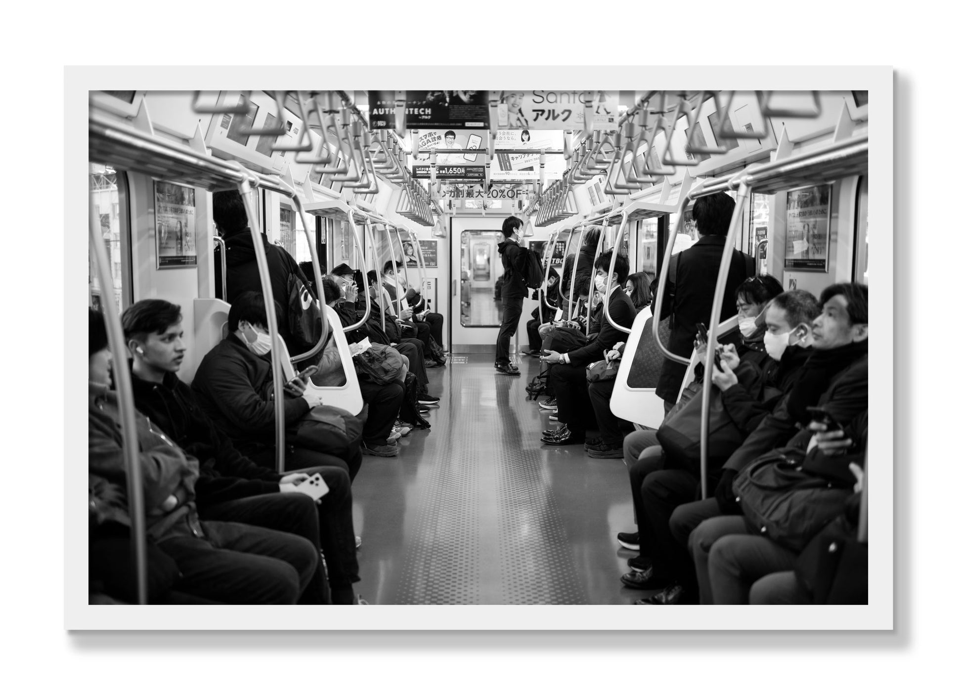 Framed photograph of Tokyo Traincar by Dylan Ozanich, White frame, Full Bleed