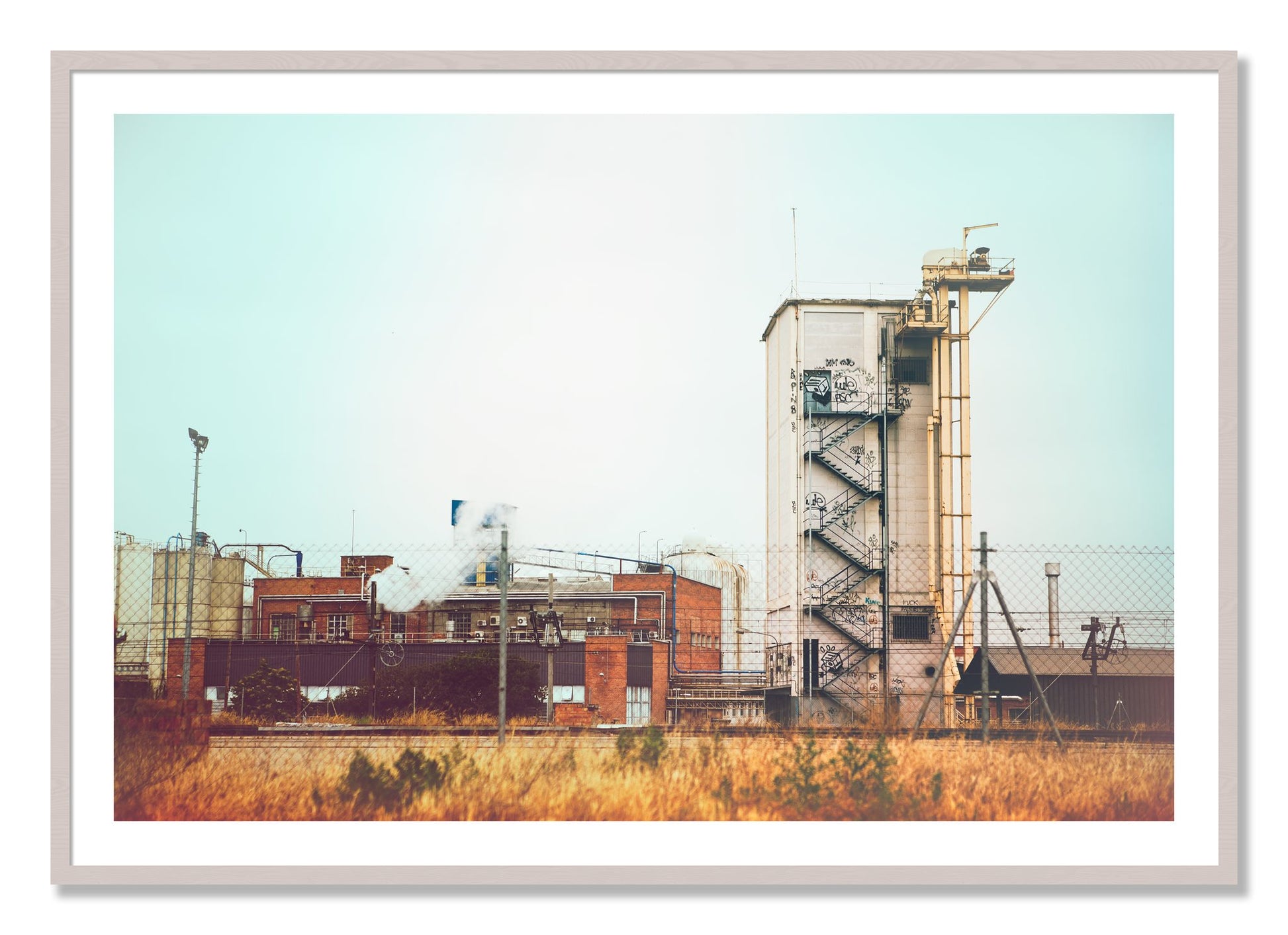 Framed photograph of Train Ride by Dylan Ozanich, White Maple frame, Borders