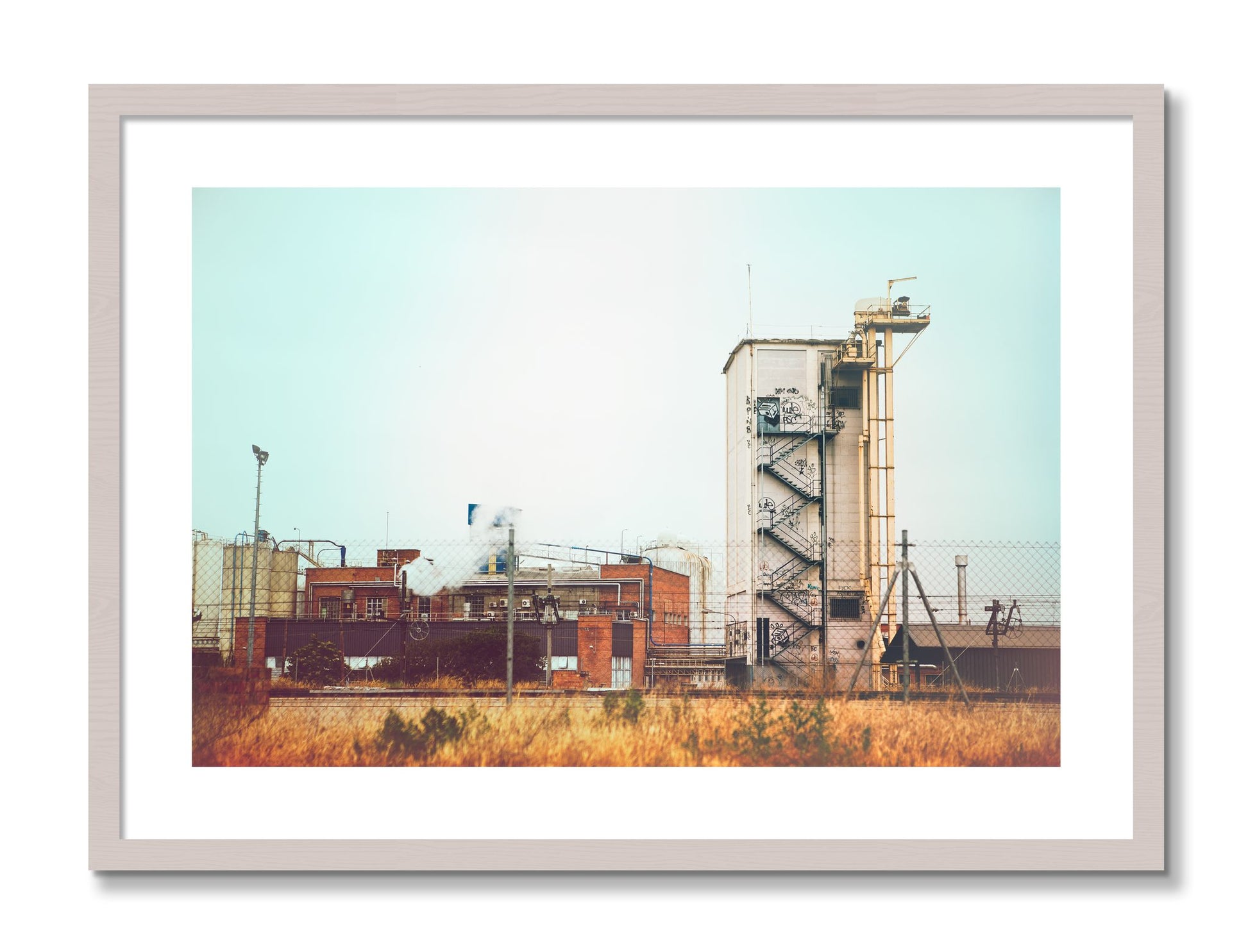 Framed photograph of Train Ride by Dylan Ozanich, White Maple frame, Borders