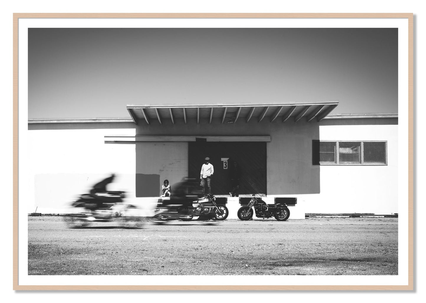 Treasure Island Racing by Dylan Ozanich, 48×72 print with a White Border in a Maple frame