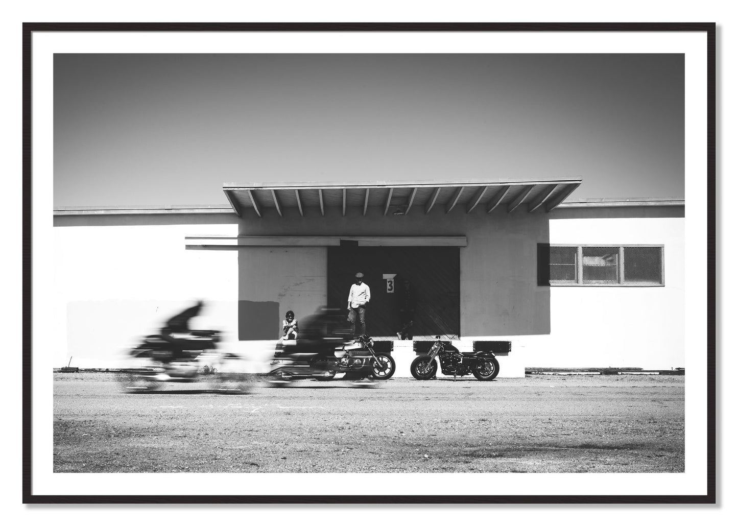 Framed photograph of Treasure Island Racing by Dylan Ozanich, Black Walnut frame, Borders