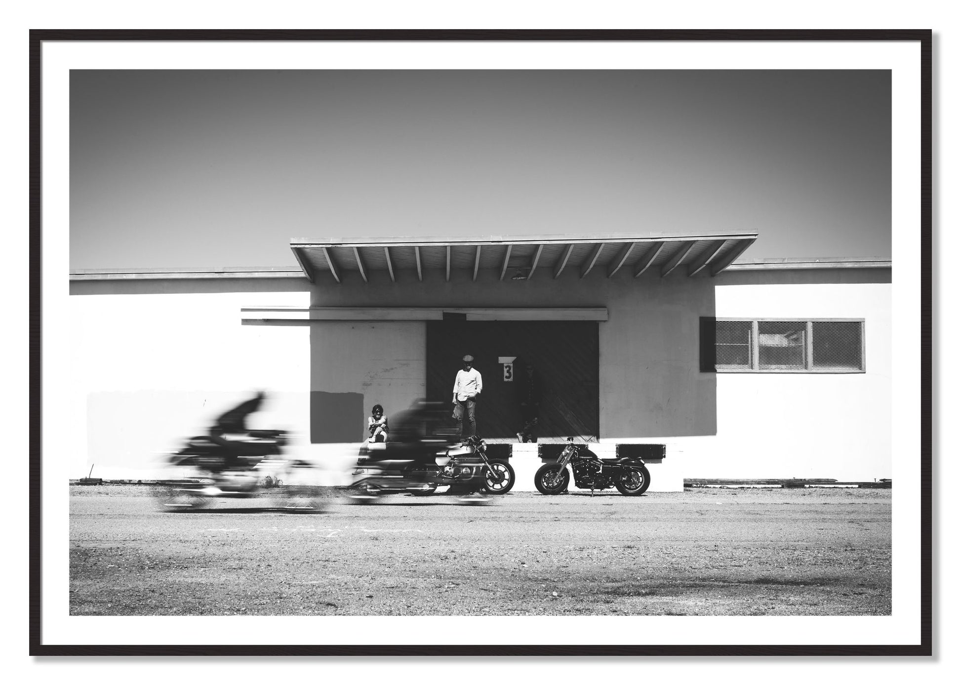 Framed photograph of Treasure Island Racing by Dylan Ozanich, Black Walnut frame, Borders