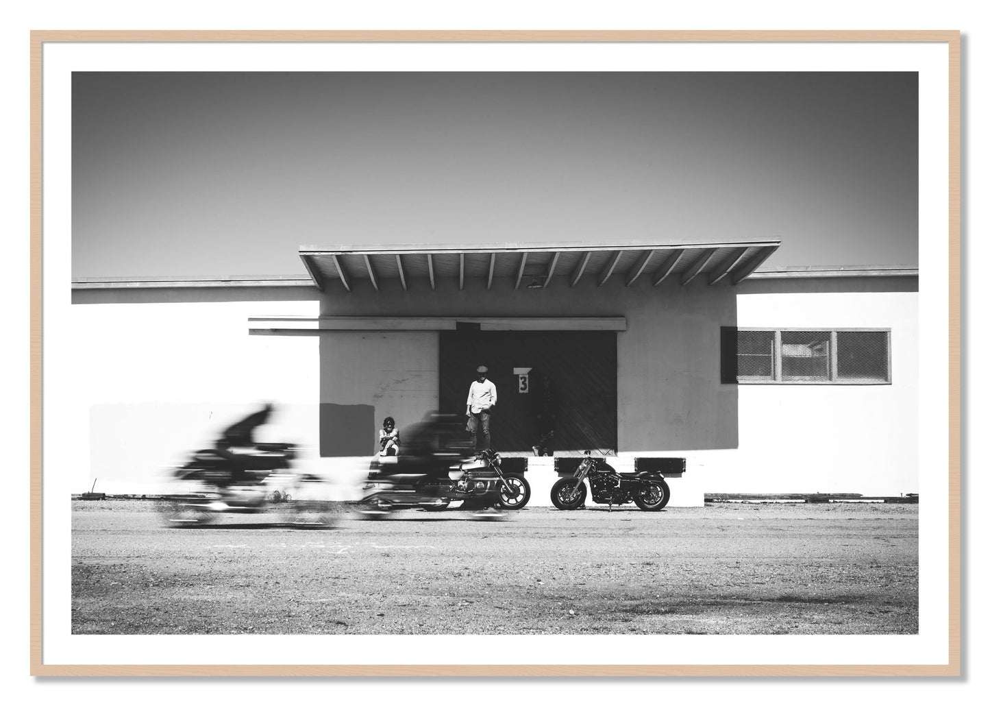 Framed photograph of Treasure Island Racing by Dylan Ozanich, Maple frame, Borders