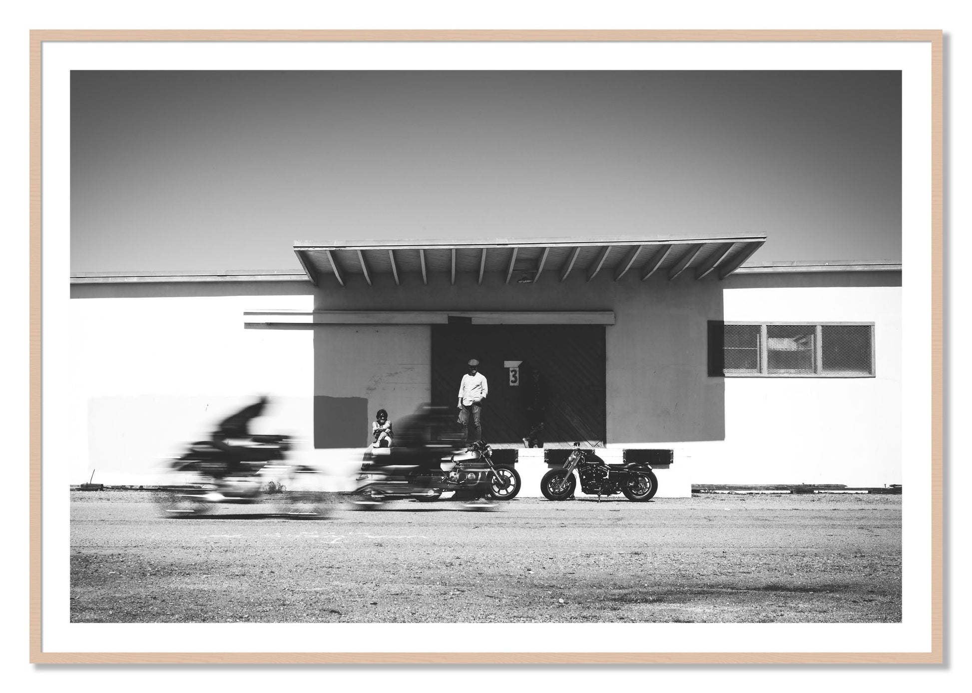 Framed photograph of Treasure Island Racing by Dylan Ozanich, Maple frame, Borders
