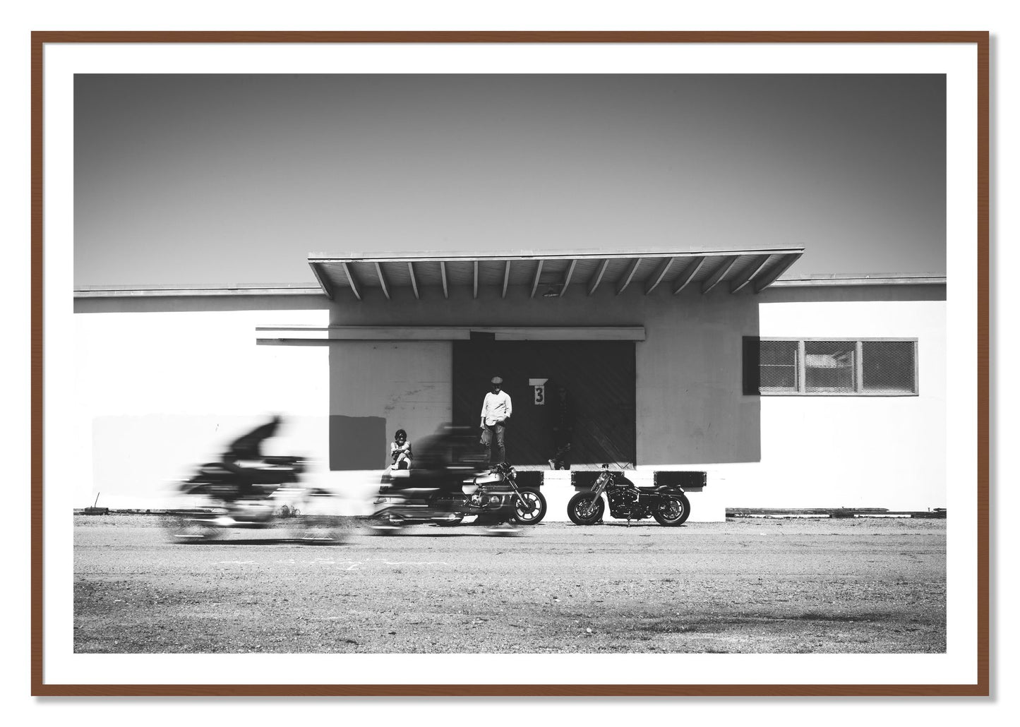 Framed photograph of Treasure Island Racing by Dylan Ozanich, Walnut frame, Borders
