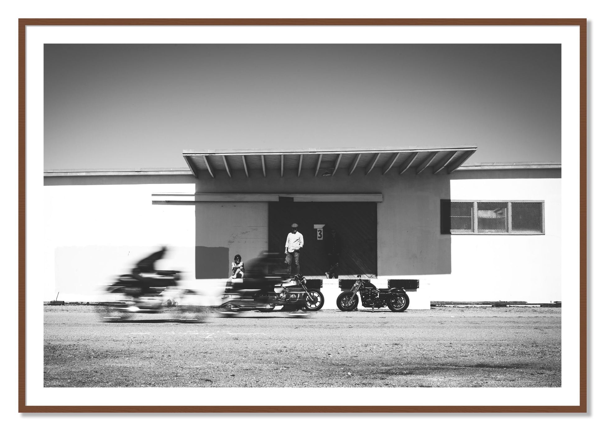 Framed photograph of Treasure Island Racing by Dylan Ozanich, Walnut frame, Borders