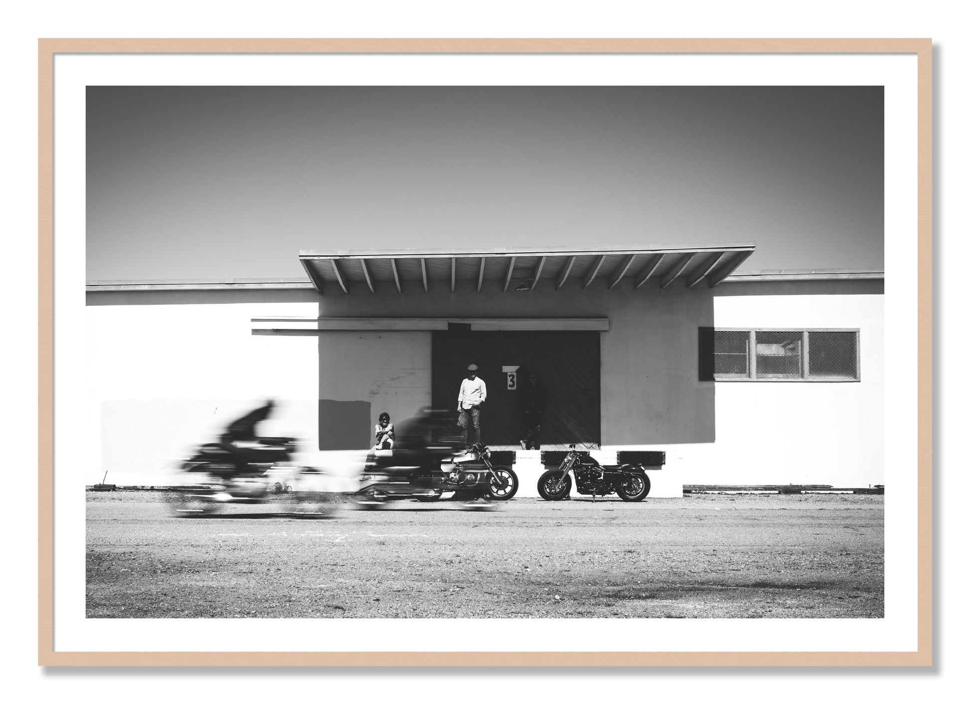 Framed photograph of Treasure Island Racing by Dylan Ozanich, Maple frame, Borders